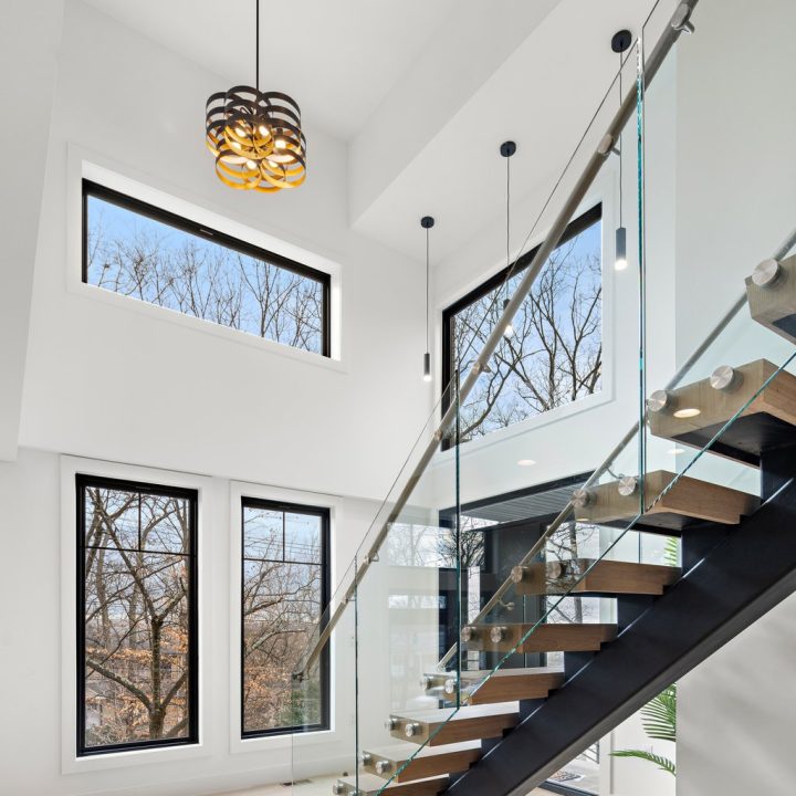 Interior of Livingston Residence, completed in 2024, showcasing custom kitchen cabinetry and a modern staircase design, located in Livingston, NJ.