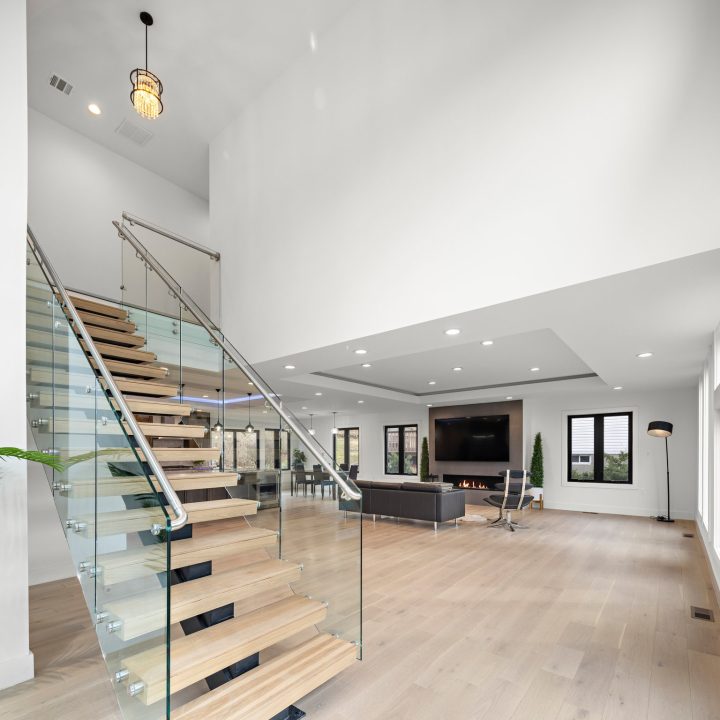 Interior of Livingston Residence, completed in 2024, showcasing custom kitchen cabinetry and a modern staircase design, located in Livingston, NJ.