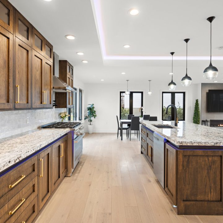 Interior of Livingston Residence, completed in 2024, showcasing custom kitchen cabinetry and a modern staircase design, located in Livingston, NJ.