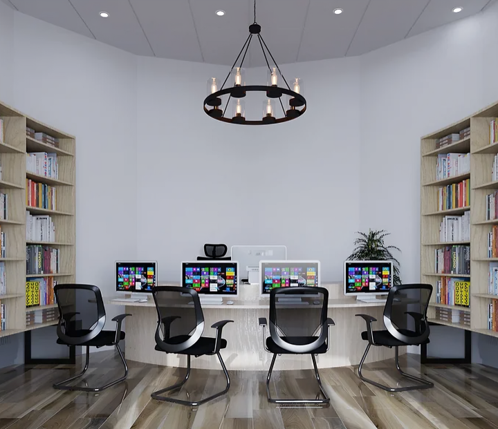 Senior staff library with rows of bookshelves filled with books, comfortable seating areas, and a quiet, sophisticated atmosphere for reading and research.