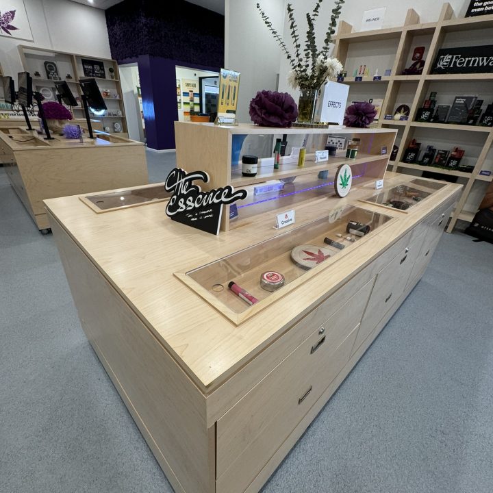 Interior of Anja Dispensary, completed in 2023, featuring custom millwork including modern wooden fixtures and intricate designs, located in Woodbridge, NJ.