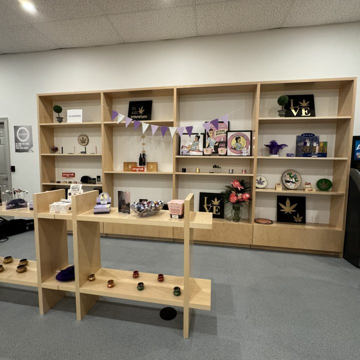 Interior of Anja Dispensary, completed in 2023, featuring custom millwork including modern wooden fixtures and intricate designs, located in Woodbridge, NJ.