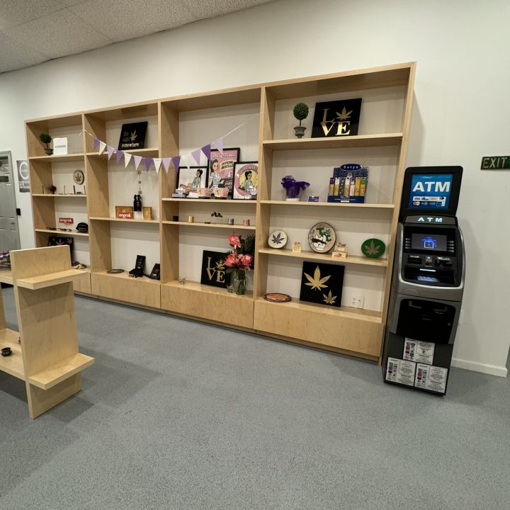 Interior of Anja Dispensary, completed in 2023, featuring custom millwork including modern wooden fixtures and intricate designs, located in Woodbridge, NJ.