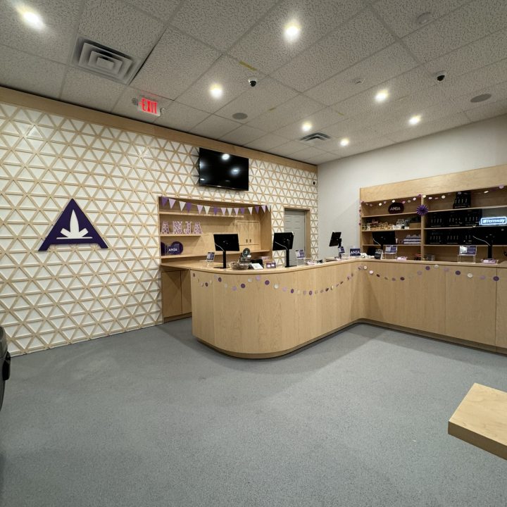 Interior of Anja Dispensary, completed in 2023, featuring custom millwork including modern wooden fixtures and intricate designs, located in Woodbridge, NJ.