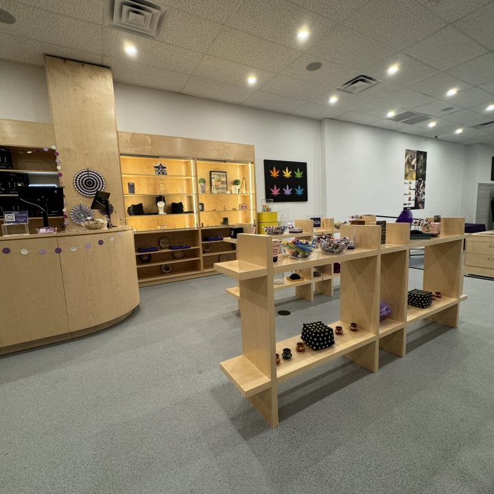 Interior of Anja Dispensary, completed in 2023, featuring custom millwork including modern wooden fixtures and intricate designs, located in Woodbridge, NJ.