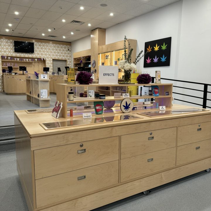 Interior of Anja Dispensary, completed in 2023, featuring custom millwork including modern wooden fixtures and intricate designs, located in Woodbridge, NJ.