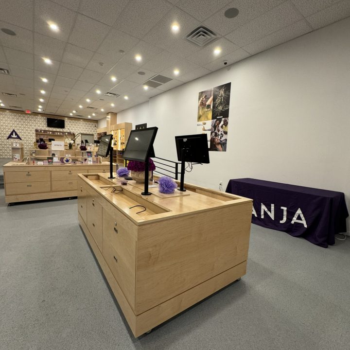 Interior of Anja Dispensary, completed in 2023, featuring custom millwork including modern wooden fixtures and intricate designs, located in Woodbridge, NJ.