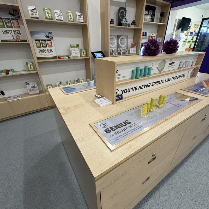 Interior of Anja Dispensary, completed in 2023, featuring custom millwork including modern wooden fixtures and intricate designs, located in Woodbridge, NJ.