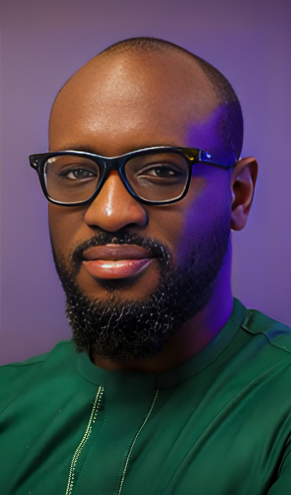 Francis Fatade, founder of Fatatelier, pictured in a professional portrait, presenting a confident and friendly demeanor